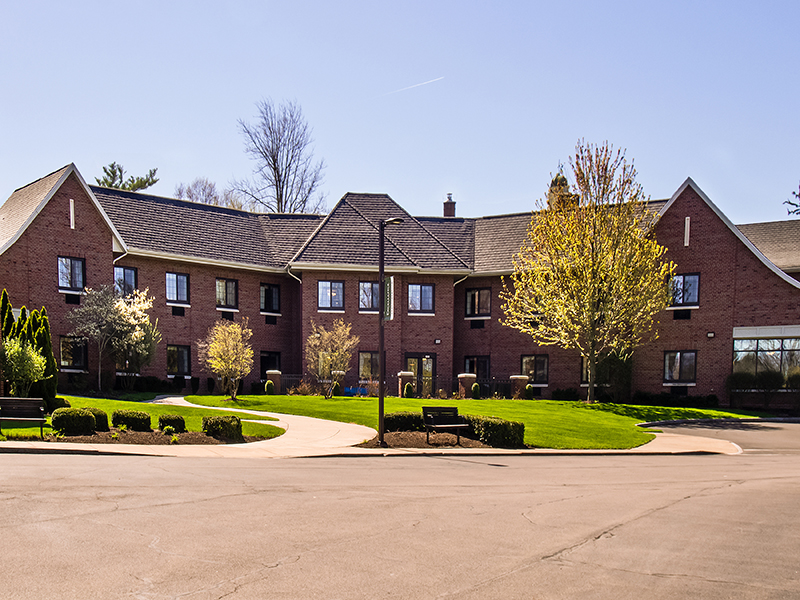 Retirement and assisted living facility on a beautiful spring day